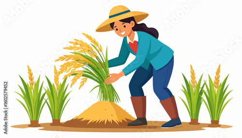 Smiling female farmer in a straw hat and boots harvesting a bundle of golden rice stalks.