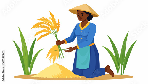 Smiling female farmer in a conical hat kneeling while harvesting golden rice stalks