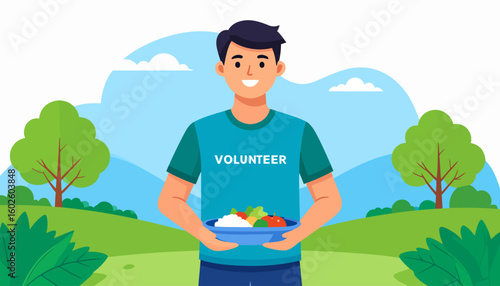 Smiling male volunteer in a blue t-shirt holding a bowl of fresh food.