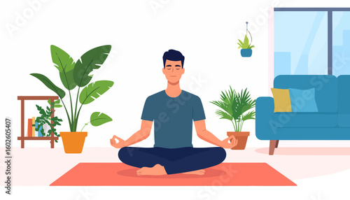 A serene man with dark hair in a blue shirt meditating in the lotus pose on a red mat.