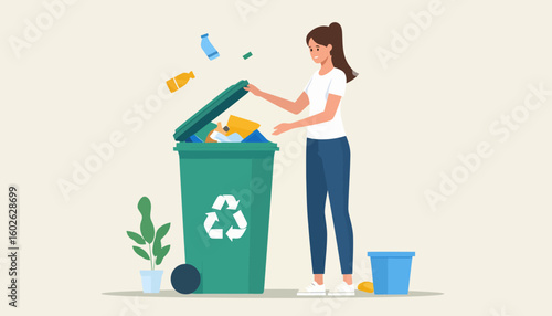 Young woman with a ponytail happily recycling plastic bottles into a large green bin with a recycling symbol.
