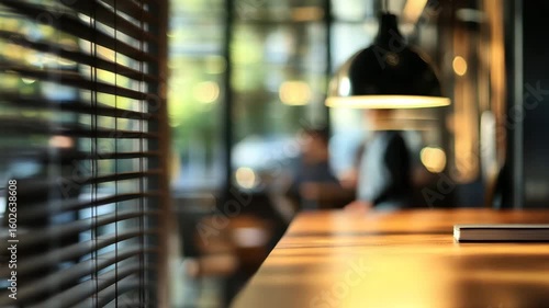 Wallpaper Mural Blurred business scene in modern office featuring wooden table, window blinds, warm light, and professional ambiance with cozy interior, hanging lamp, and soft focus ambient lighting Torontodigital.ca