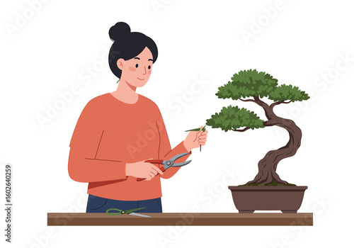 A woman with a bun is pruning a bonsai tree with pruning shears on a wooden table.