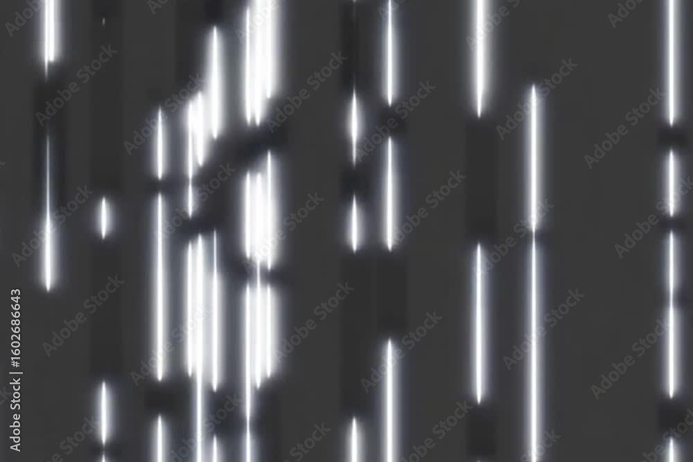Abstract light streaks creating an enigmatic visual effect, with lines of varying length and intensity against a dim background