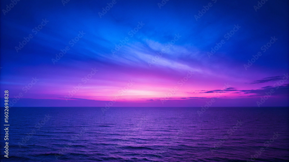 Obraz premium Majestic sunset over the ocean displaying breathtaking sky colors with reflections on water