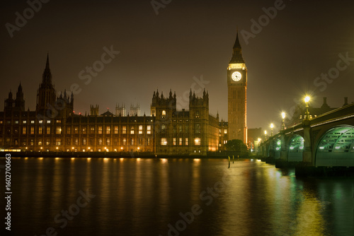 View of Big Ben, Westminster Place and Bridge across the River Thames at night