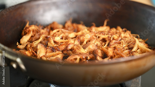 Pulled Lion's Mane Mushrooms - Cooked in Pan and Coated with Sauce