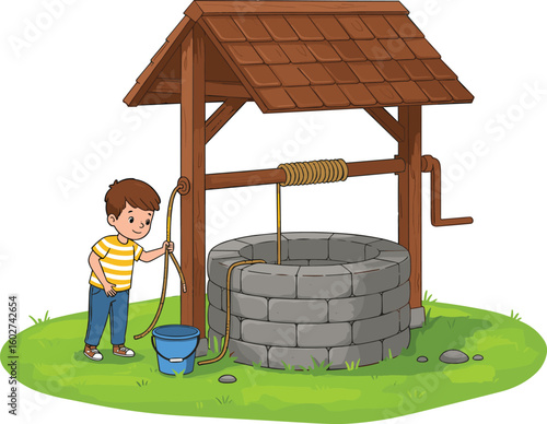 Smiling boy pulling water from stone well, using rope and bucket, in green grassy outdoor area with wooden roof shelter