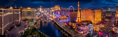 A stunning view of the Las Vegas Strip illuminated at night showcasing vibrant lights and iconic landmarks along the famous boulevard