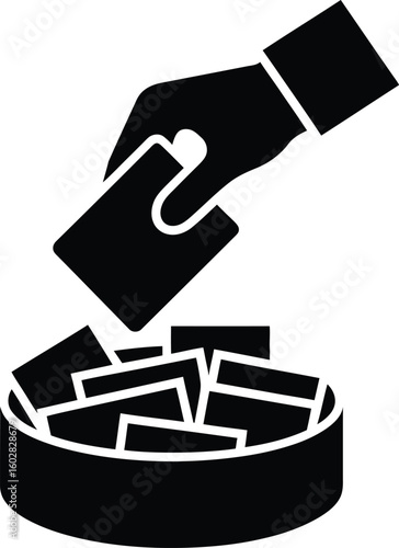 Hand dropping a card into a collection box or lottery drum