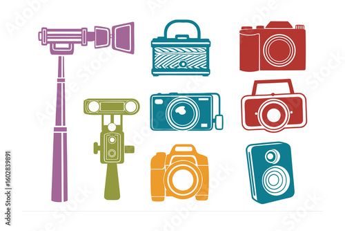 Collection of vintage and modern photography equipment including cameras and selfie sticks