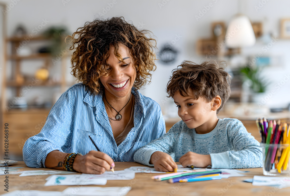 Happy mother and son drawing together at a table, surrounded by colored pencils, enjoying creative time and bonding at home in a cozy environment.
Happy mother and son drawing together at a table, surrounded by colored pencils, enjoying creative time and bonding at home in a cozy environment.