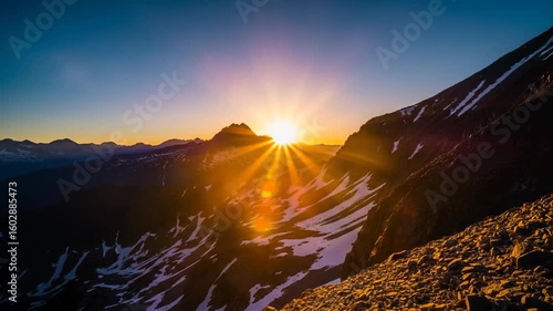 Sunrise Over Snowy Mountain Peaks