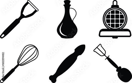 A set of stainless steel kitchen utensils, including a spatula, spoon, and fork, isolated on a white background