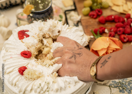hand destroying cake grabbing pastry picnic smash