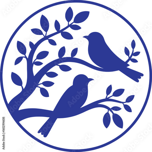Blue birds perched on branches within a circular frame leaves tree