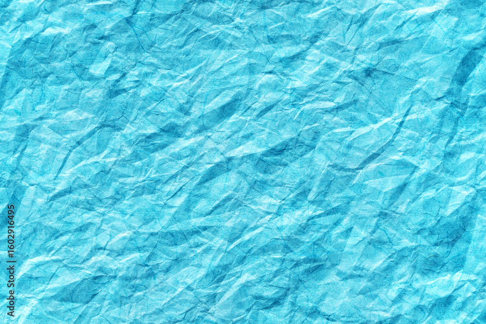 Obraz premium Crumpled Blue Paper Background