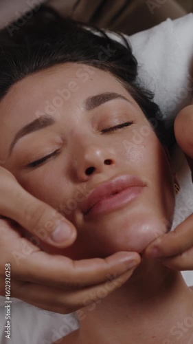 Facial Massage with Hands Holding Chin and Jawline