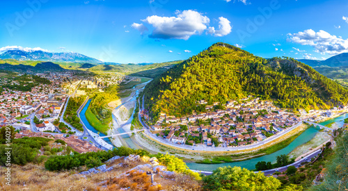 Historical Ottoman Houses in neighborhoods Gorica and Mangalem in Berat, with bridges over river Osum, Albania.