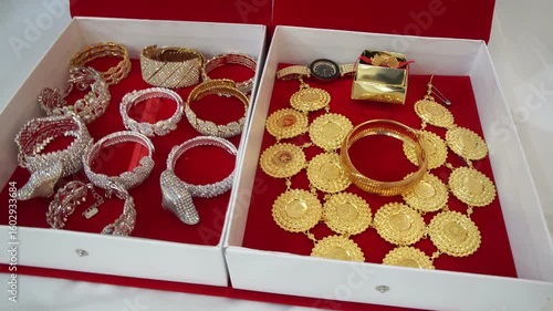 Gold jewelry in the paper box for Muslim bride. Prepare a wedding ceremony