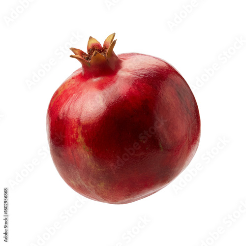 whole pomegranate fruit isolated on white, ripe red pomegranate with crown, fresh pomegranate studio photo
