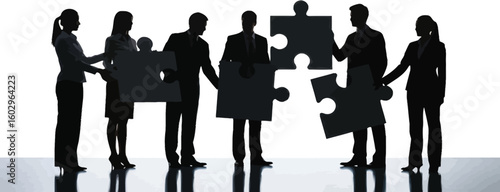A team of professionals works together to assemble puzzle pieces creating a unified whole