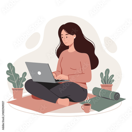 Woman sitting on floor with laptop and plants working calmly