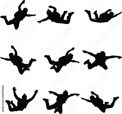 Collection of nine black silhouette skydivers in freefall positions against white background