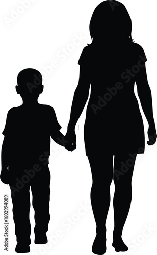 Silhouette of a mother and son walking together holding hands depicting parental love and family bonds