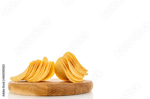 Crispy potato chips isolated on white background, close-up.
