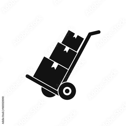A hand truck with stacked boxes is ready for delivery and transport