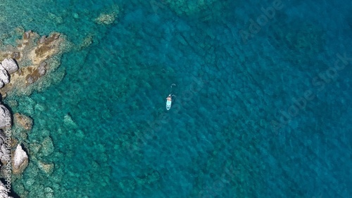 Aerial View of Secluded Beach Cove with Turquoise Waters in Mani Peninsula, Peloponnese, Greece, Delfinia beach
