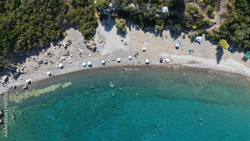 Aerial View of Secluded Beach Cove with Turquoise Waters in Mani Peninsula, Peloponnese, Greece, Delfinia beach