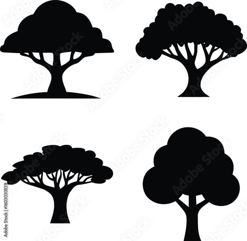 Set of four black tree silhouettes isolated on white background