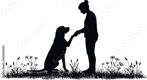 Silhouette of dog and person shaking hands in wildflower field, nature bonding, trust, companionship, peaceful outdoor moment, human connection