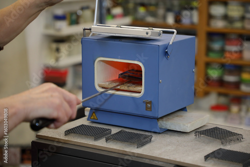 Technology of manufacturing enamel jewelry. Furnace for firing products. Process of manufacturing jewelry. Mini furnace. Melting temperature. Hot chamber. Clay firing chamber