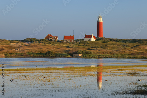 In the Centre, Texel in the Netherlands, Lighthouse, lake, reflection of the lighthouse in the lake, nature reserve