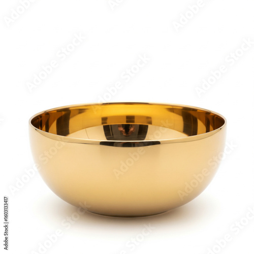 A shiny golden bowl isolated on white
