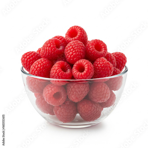 A clear bowl of raspberries isolated on white 