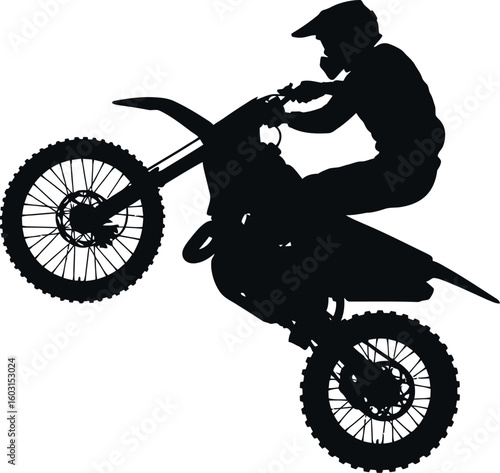 Silhouette of a motocross rider performing a wheelie on a dirt bike against a white background