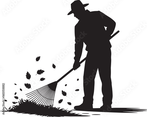 Man raking leaves in silhouette autumn outdoors