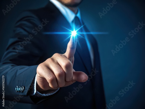 Businessman s finger activates bright blue digital light burst