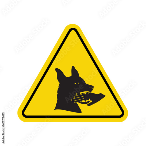 warning sign with black silhouette of dog biting hand on yellow triangular background