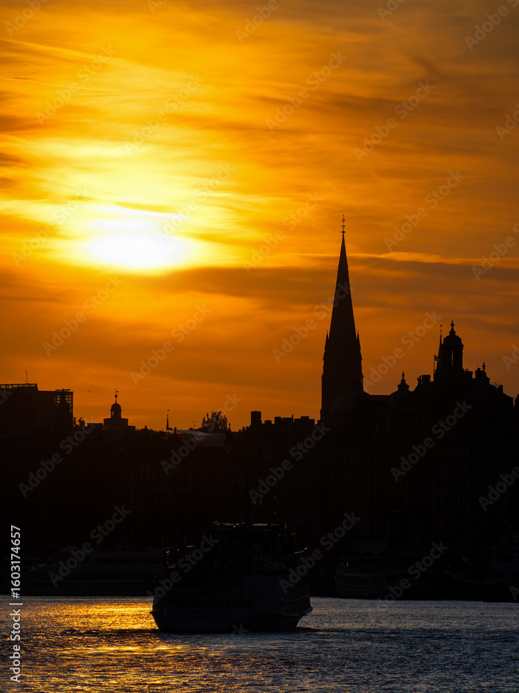 Fototapeta premium Stunning Sunset Over City Skyline of Stockholm
