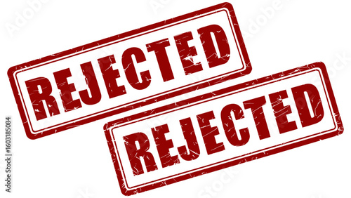 Two red rejected stamps over white background