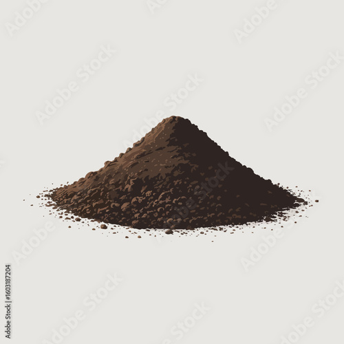 A small pile of dark granular soil or compost on a light background