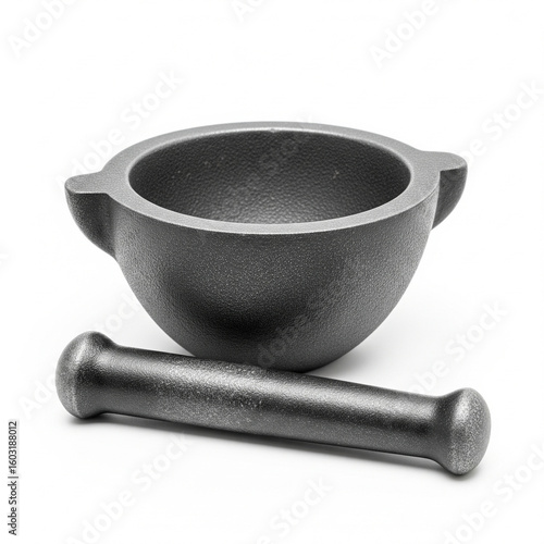 A metal mortar and pestle isolated on white