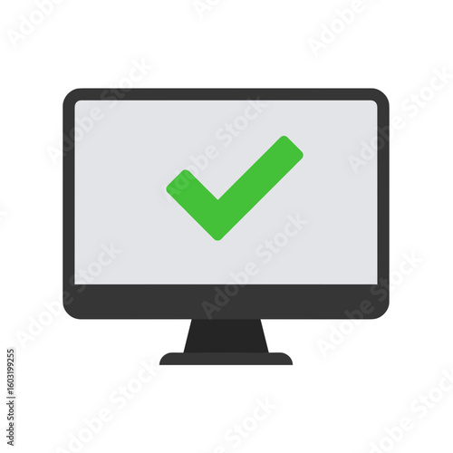 Computer monitor displaying green check mark on white screen  