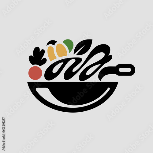 Black wok with colorful vegetables and leaves on white background cooking food