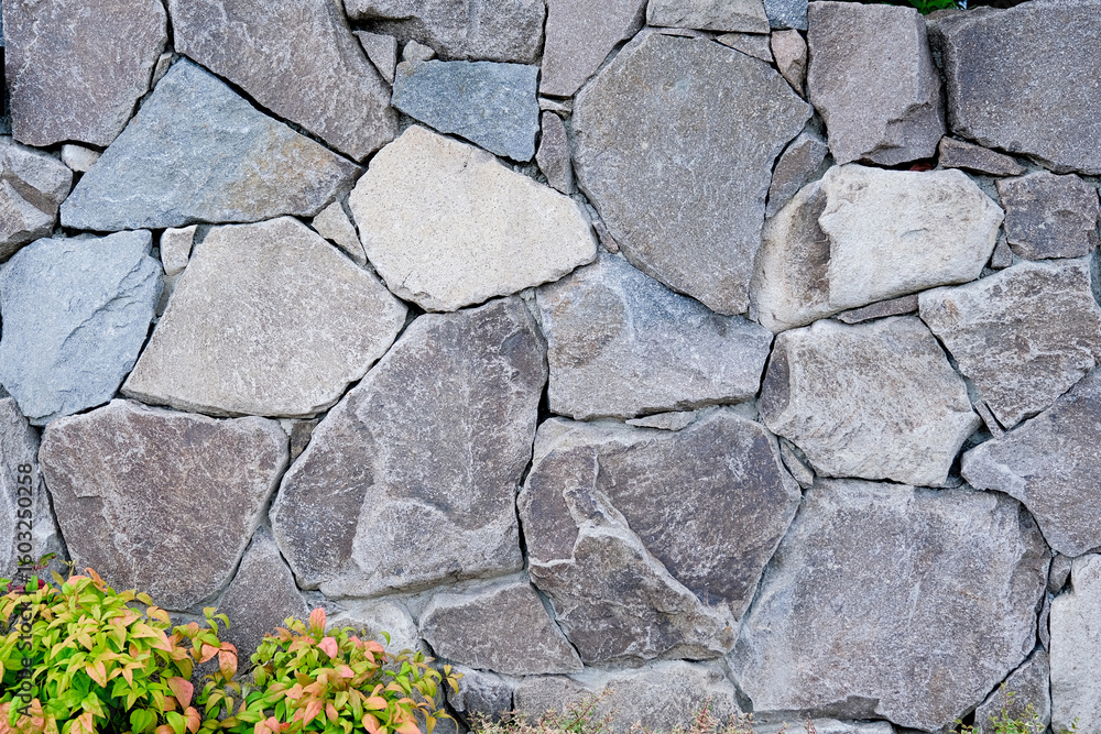 Obraz premium Old stone wall patterned texture or background